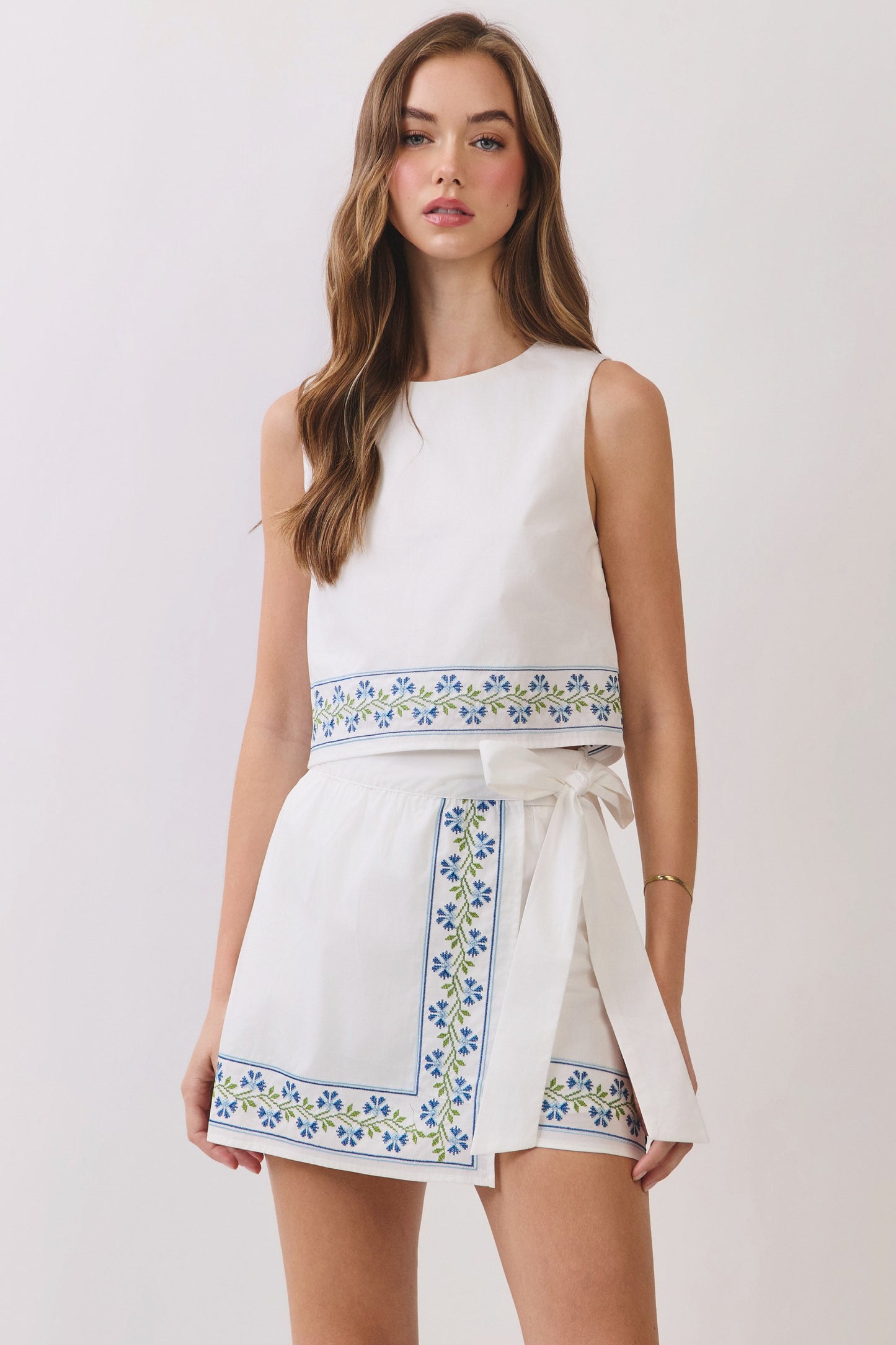 Floral Embroidered Hem Sleeveless Crop Top