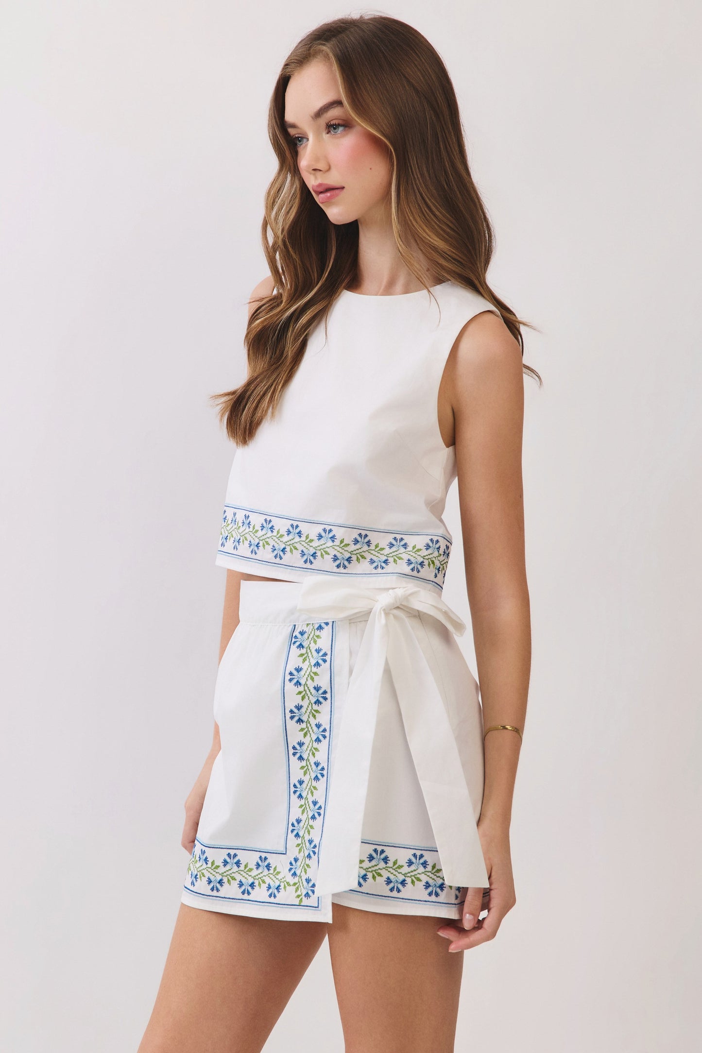 Floral Embroidered Hem Sleeveless Crop Top